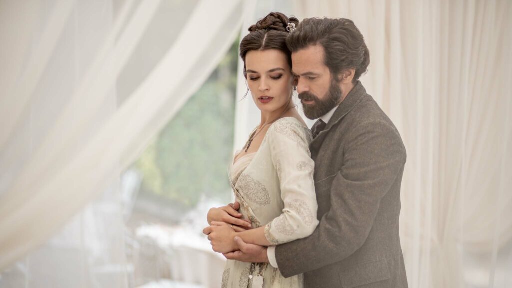 Emma Mackey as Adrienne Bourges and Romain Duris as Gustave Eiffel in Eiffel, directed by Martin Bourboulon. Photo: Antonin Menichetti. Copyright: Vertigo Releasing. All Rights Reserved.