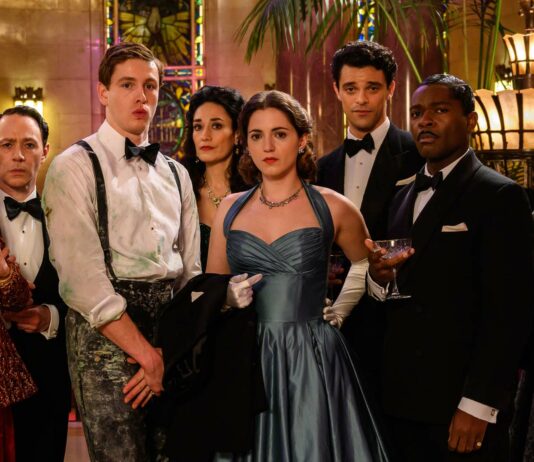 Ruth Wilson as Petula Spencer, Reece Shearsmith as John Woolf, Harris Dickinson as Dickie Attenborough, Sian Clifford as Edana Romney, Pearl Chanda as Sheila Sim, Jacob Fortune Lloyd as Gio, David Oyelowo as Mervyn Cocker-Norris and Ania Marson as Mother in See How They Run, directed by Tom George. Photo: Parisa Taghizadeh. Copyright: 2021 20th Century Studios. All Rights Reserved.