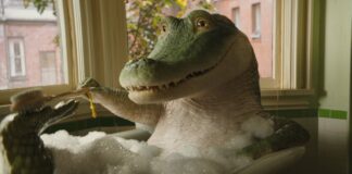 Lyle (voiced by Shawn Mendes) takes a bath in Lyle, Lyle, Crocodile. Copyright: CTMG, Inc. All Rights Reserved.