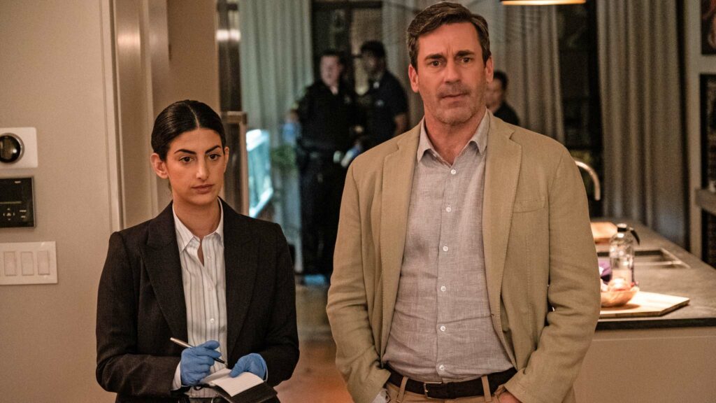 Ayden Mayeri as Detective Griz and Jon Hamm as Irwin 