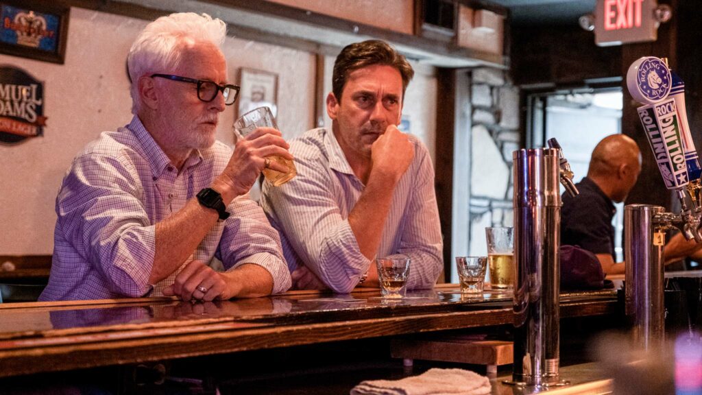 John Slattery as Frank Jaffe and Jon Hamm as Irwin 