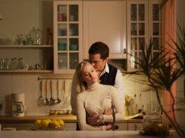 Maika Monroe as Julia and Karl Glusman as Francis in Watcher, directed by Chloe Ikuno. Copyright: Universal Pictures. All Rights Reserved.