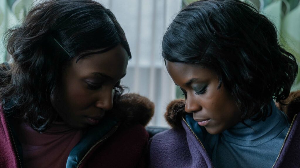 Tamara Lawrance as Jennifer Gibbons and Letitia Wright as June Gibbons in The Silent Twins, directed by Agnieszka Smoczynska. Photo: Lukasz Bak. Copyright: 2022 Focus Features, LLC. All Rights Reserved.