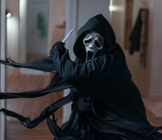 Ghost Face in Scream VI, directed by Matt Bettinelli-Olpin and Tyler Gillett. Photo: Philippe Bosse. Copyright: 2022 Paramount Pictures. All Rights Reserved. Ghost Face is a Registered Trademark of Fun World Div., Easter Unlimited, Inc. All Rights Reserved.