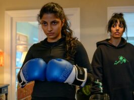 Priya Kansara as Ria Khan and Ritu Arya as her sister Lena in Polite Society, directed by Nida Manzoor. Photo: Parisa Taghizadeh. Copyright: Focus Features LLC. All Rights Reserved.
