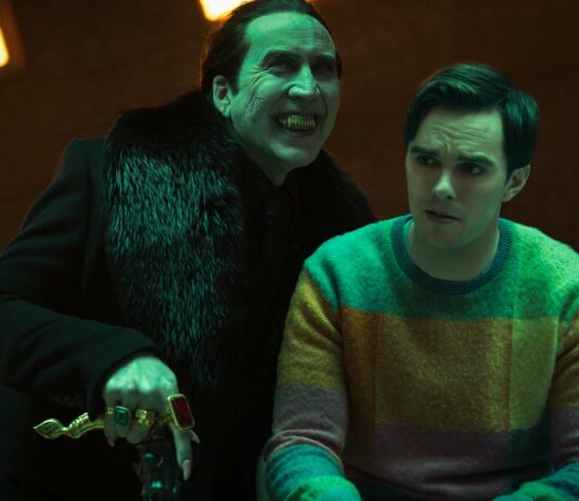 Nicolas Cage as Dracula and Nicholas Hoult as Renfield in Renfield, directed by Chris McKay. Photo: Michele K Short. Copyright: Universal Studios. All Rights Reserved.
