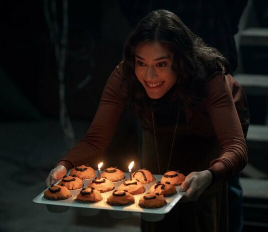 Lizzy Caplan as Carol in Cobweb, directed by Samuel Bodin. Photo: Vlad Cioplea. Copyright: Lionsgate. All Rights Reserved.