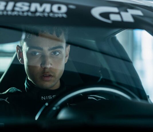 Archie Madekwe as Jann Mardenborough in Gran Turismo, directed by Neill Blomkamp. Photo: Gordon Timpen. Copyright: CTMG. All Rights Reserved. Gran Turismo is a trademark of Sony Interactive Entertainment Inc. All Rights Reserved.