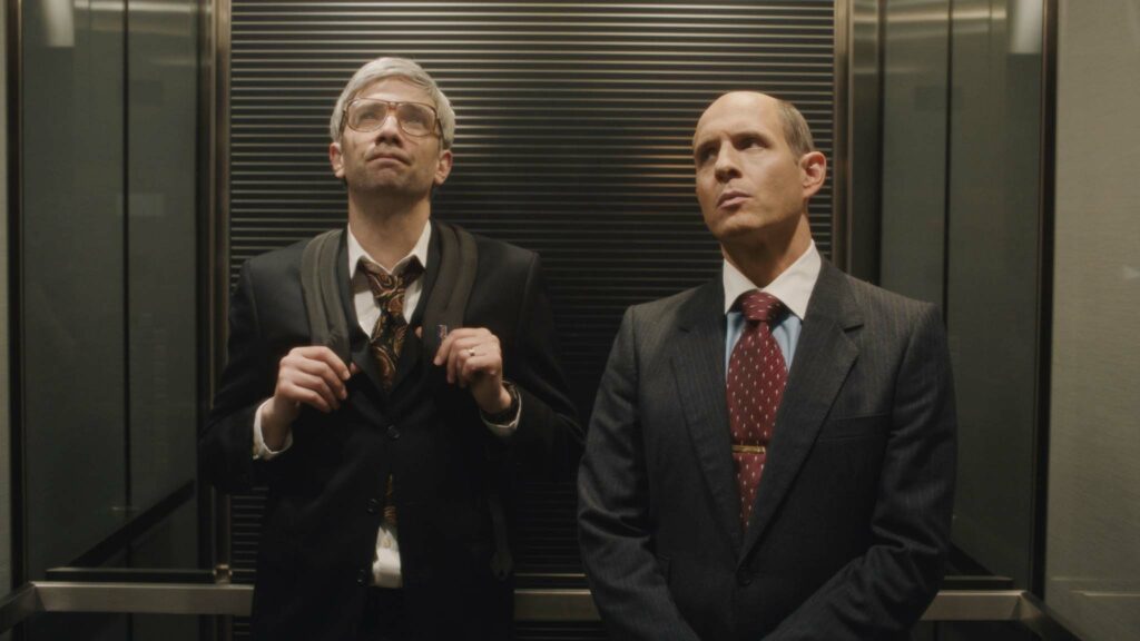 Jay Baruchel as Mike Lazaridis and Glenn Howerton as Jim Balsillie in BlackBerry, directed by Matt Johnson. Copyright: National Amusements/Piece Of Magic Entertainment. All Rights Reserved.