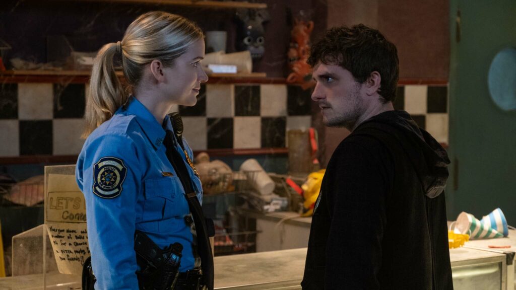 Elizabeth Lail as Vanessa Shelly and Josh Hutcherson as Mike in Five Nights at Freddy's, directed by Emma Tammi. Photo: Patti Perret. Copyright: Universal Pictures. All Rights Reserved.