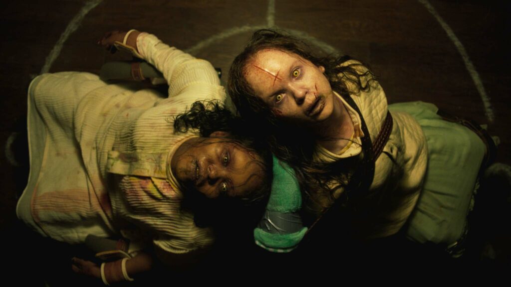 Lidya Jewett as Angela Fielding and Olivia Marcum as Katherine in The Exorcist: Believer, directed by David Gordon Green. Copyright: Universal Studios. All Rights Reserved.