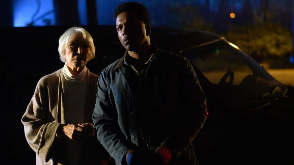 Ellen Burstyn as Chris MacNeil and Leslie Odom, Jr as Victor Fielding in The Exorcist: Believer, directed by David Gordon Green. Photo: Anne Marie Fox. Copyright: Universal Studios. All Rights Reserved.