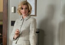 Anne Hathaway as Dr Rebecca St John in Eileen, directed by William Oldroyd. Photo: Jeong Park. Copyright: Universal Pictures. All Rights Reserved.
