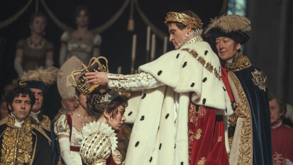 Vanessa Kirby as Empress Josephine and Joaquin Phoenix as Napoleon Bonaparte in Napoleon, directed by Ridley Scott. Photo: Aidan Monaghan. Copyright: Apple. All Rights Reserved.