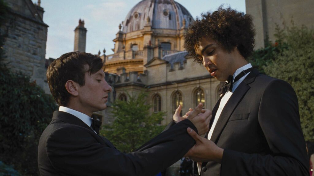 Barry Keoghan as Oliver Quick and Archie Madekwe as Farleigh Start in Saltburn, directed by Emerald Fennell. Copyright: MGM/Amazon Content Services LLC. All Rights Reserved.