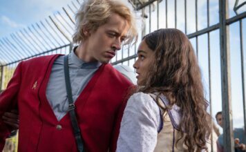 Tom Blyth as Coriolanus Snow and Rachel Zegler as Lucy Gray Baird in The Hunger Games: The Ballad of Songbirds & Snakes, directed by Francis Lawrence. Photo: Murray Close. Copyright: Lionsgate. All Rights Reserved.