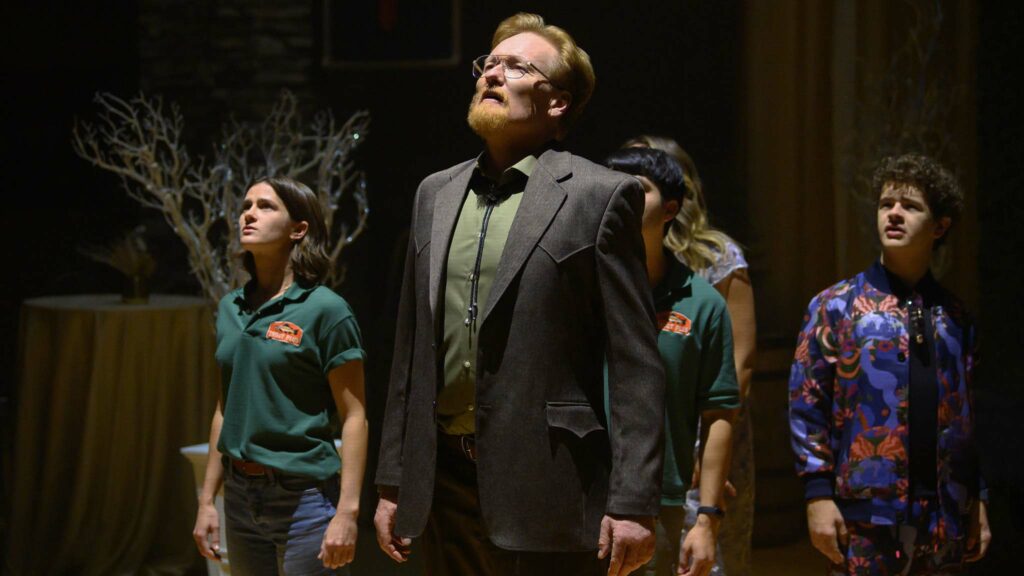 Conan O’Brien as Farley and Gaten Matarazzo as himself in Please Don’t Destroy: The Treasure Of Foggy Mountain, directed by Paul Briganti. Photo: Anne Marie Fox. Copyright: Peacock/Universal Studios. All Rights Reserved.