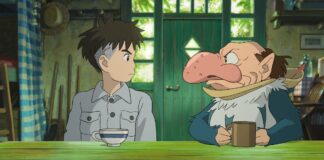 Mahito Maki (voiced by Soma Santoki) and The Grey Heron (Masaki Suda) in The Boy And The Heron, directed by Hayao Miyazaki. Copyright: Studio Ghibli/Elysian. All Rights Reserved.