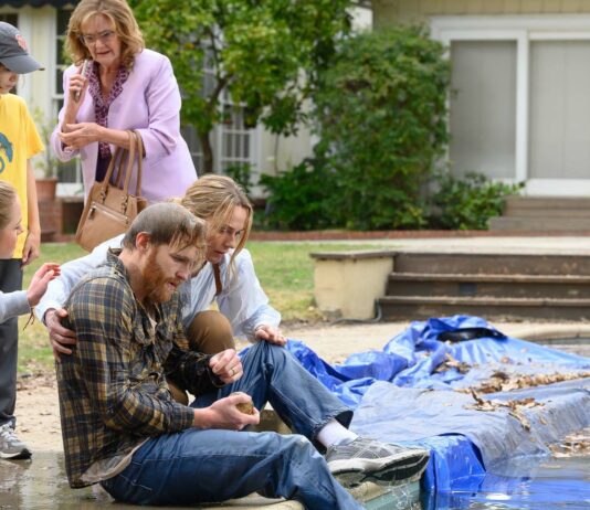 Amelie Hoeferle as Izzy Waller, Gavin Warren as Elliot Waller, Nancy Lenehan as Kay, Wyatt Russell as Ray Waller and Kerry Condon as Eve Waller in Night Swim, directed by Bryce McGuire. Photo: Anne Marie Fox. Copyright: Universal Studios. All Rights Reserved.