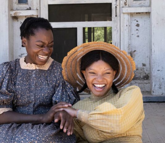 Phylicia Pearl Mpasi as Young Celie and Halle Bailey as Young Nettie in The Color Purple, directed by Blitz Bazawule. Copyright: Warner Bros. Entertainment Inc. All Rights Reserved.