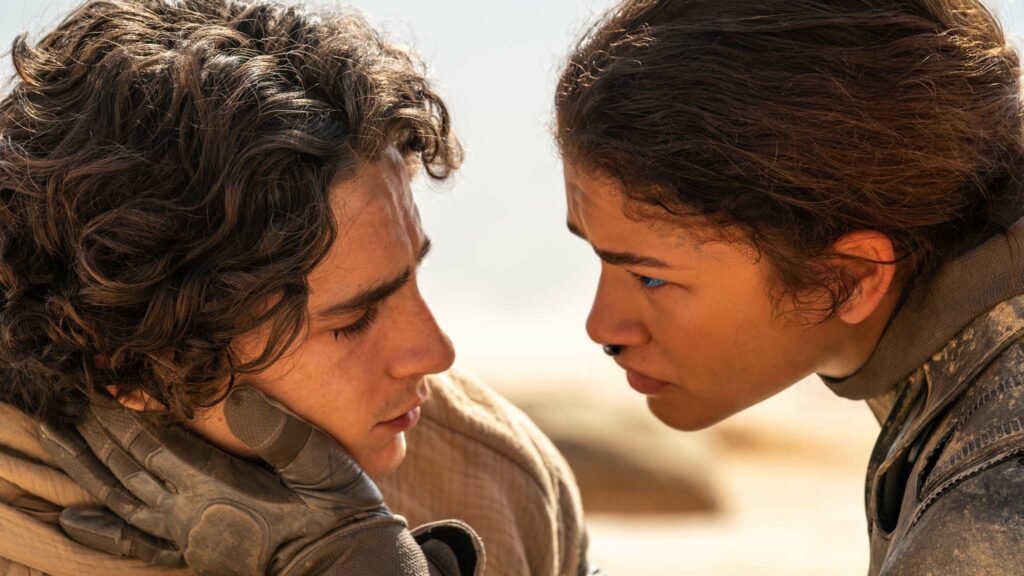 Timothee Chalamet as Paul Atreides and Zendaya as Chani in Dune: Part Two, directed by Denis Villeneuve. Photo: Niko Tavernise. Copyright: Warner Bros. Entertainment Inc. All Rights Reserved.