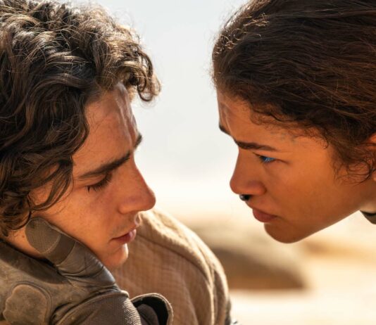 Timothee Chalamet as Paul Atreides and Zendaya as Chani in Dune: Part Two, directed by Denis Villeneuve. Photo: Niko Tavernise. Copyright: Warner Bros. Entertainment Inc. All Rights Reserved.