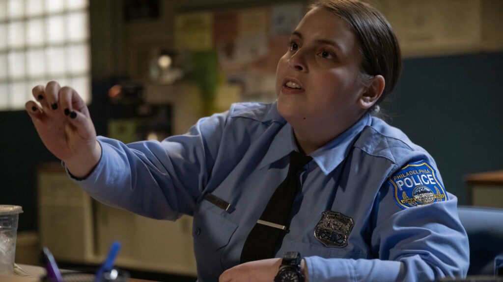 Beanie Feldstein as Sukie in Drive-Away Dolls, directed by Ethan Coen. Photo: Wilson Webb. Copyright: Working Title/Focus Features. All Rights Reserved.