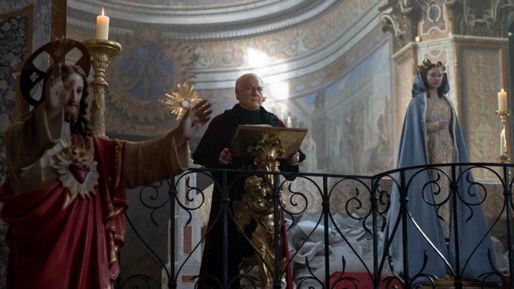 Giorgio Colangeli as Cardinal Franco Merola and Sydney Sweeney as Sister Cecilia in Immaculate, directed by Michael Mohan. Photo: Fabio Lovino. Copyright: BBP Immaculate, LLC/Black Bear. All Rights Reserved.