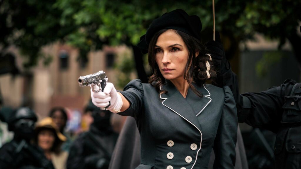 Famke Janssen as Hilda Van Der Koy in Boy Kills World, directed by Moritz Mohr. Photo: Graham Bartholomew. Copyright: Nthibah Pictures/Signature Entertainment. All Rights Reserved.