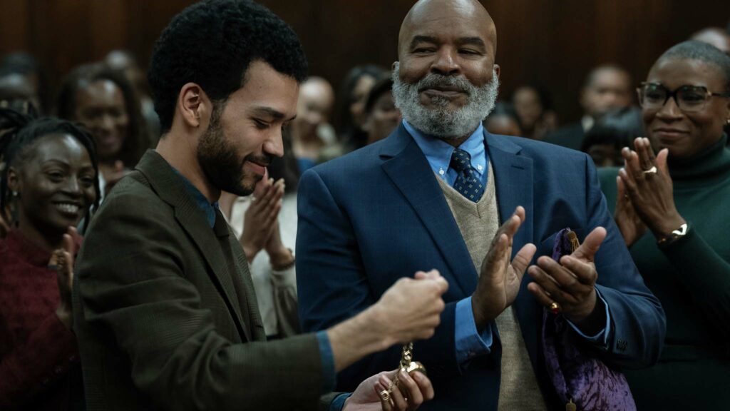 Justice Smith as Aren, David Alan Grier as Roger and Aisha Hinds as Gabbard in The American Society Of Magical Negroes, directed by Kobi Libii. Photo: Tobin Yelland. Copyright: Focus Features, LLC. All Rights Reserved.