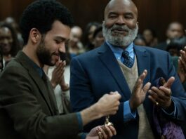 Justice Smith as Aren, David Alan Grier as Roger and Aisha Hinds as Gabbard in The American Society Of Magical Negroes, directed by Kobi Libii. Photo: Tobin Yelland. Copyright: Focus Features, LLC. All Rights Reserved.