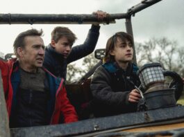 Nicolas Cage as Paul, Maxwell Jenkins as Thomas and Jaeden Martell as Joseph in Arcadian, directed by Ben Brewer. Copyright: RLJE Films/Shudder. All Rights Reserved.