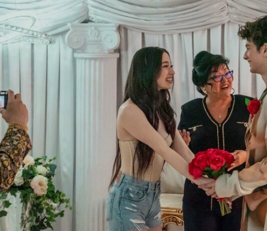 Mikey Madison as Ani and Mark Eidelshtein as Ivan in Anora, directed by Sean Baker. Photo: Augusta Quirk. Copyright: Anora Productions, LLC. All Rights Reserved.