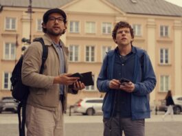 Will Sharpe as James and Jesse Eisenberg as David Kaplan in A Real Pain, directed by Jesse Eisenberg. Copyright: Searchlight Pictures. All Rights Reserved.