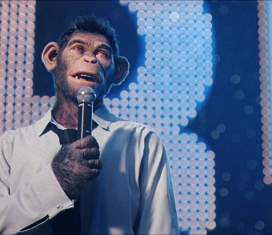 Jonno Davies as Robbie Williams in Better Man, directed by Michael Gracey. Copyright: Paramount Pictures/Better Man AU Pty Ltd. All Rights Reserved.