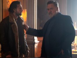 Aaron Taylor Johnson as Sergei Kravinoff and Russell Crowe as Nikolai Kravinoff in Kraven The Hunter, directed by JC Chandor. Photo: Jay Maidment. Copyright: CTMG, Inc. All Rights Reserved.