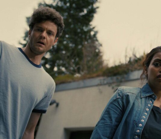 Jack Quaid as Josh and Megan Suri as Kat in Companion, directed by Drew Hancock. Copyright: Warner Bros. Entertainment Inc. All Rights Reserved.