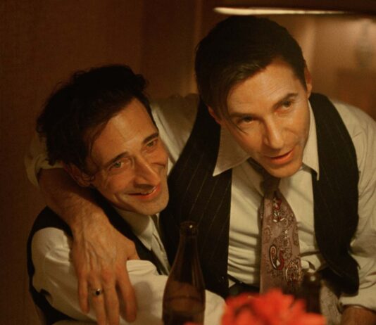 Adrien Brody as Laszlo Toth and Alessandro Nivola as Attila in The Brutalist, directed by Brady Corbet. Copyriight: Universal Pictures. All Rights Reserved.