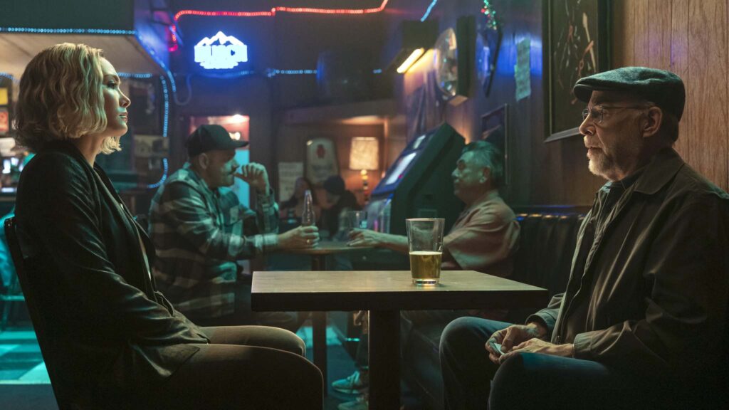 Daniella Pineda as Anais and JK Simmons as Ray King in The Accountant 2, directed by Gavin O'Connor. Photo: Warrick Page. Copyright: Warner Bros. Entertainment Inc./Amazon Content Services LLC. All Rights Reserved.