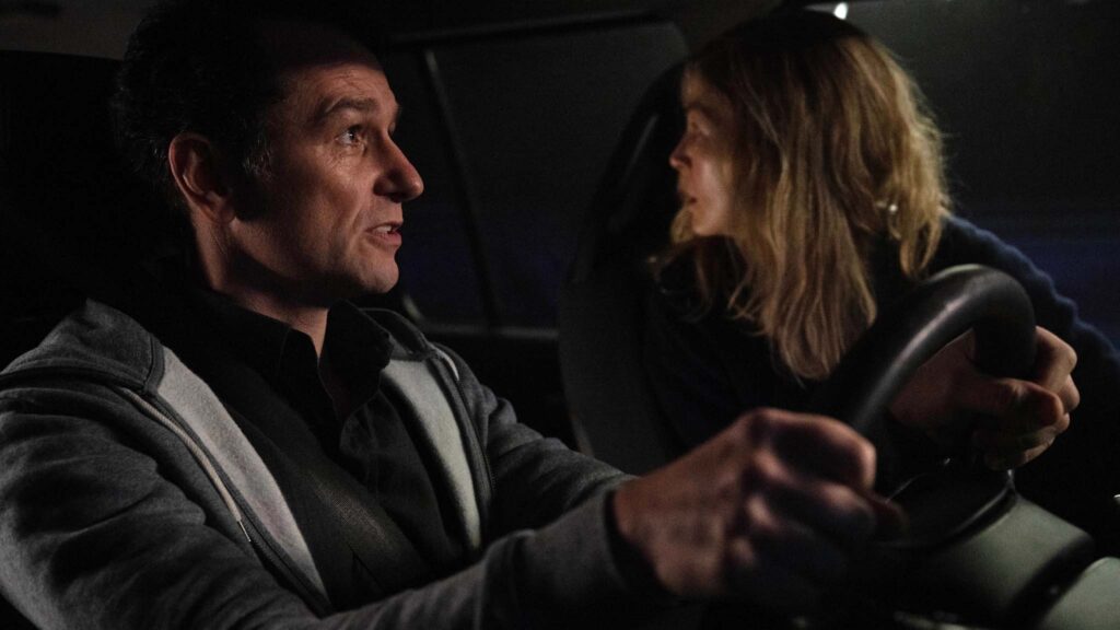 Matthew Rhys as Frank and Rosamund Pike as Maddie in Hallow Road, directed by Babak Anvari. Copyright: Universal Pictures. All Rights Reserved.