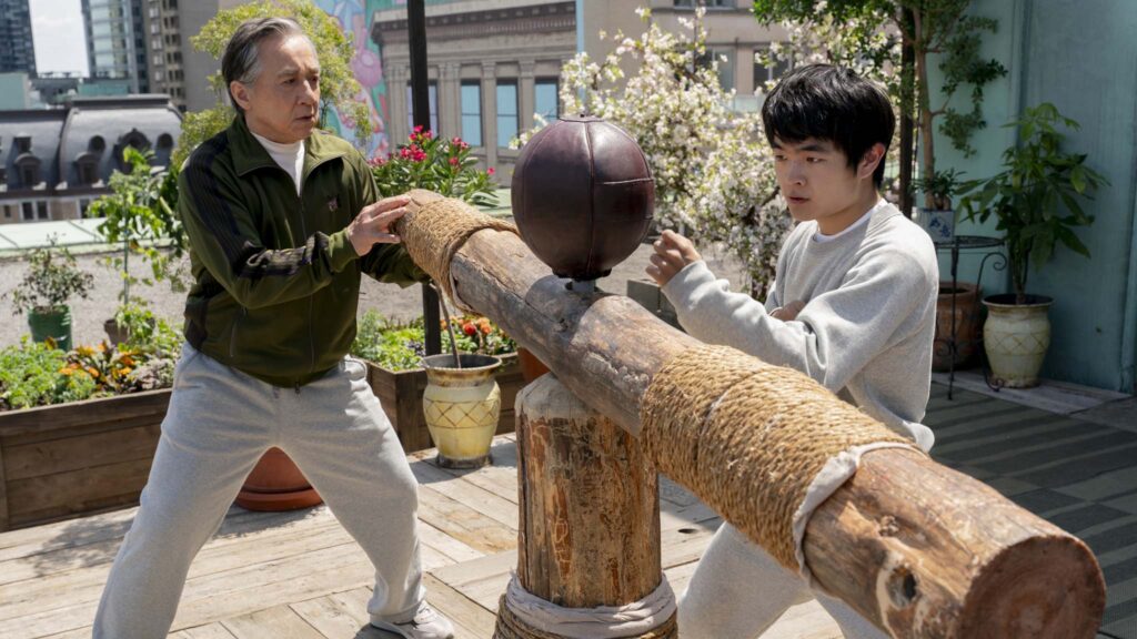 Jackie Chan as Mr Han and Ben Wang as Li Fong. in Karate Kid: Legends, directed by Jonathan Entwistle. Photo: Jonathan Wenk. Copyright: CTMG, Inc. All Rights Reserved.