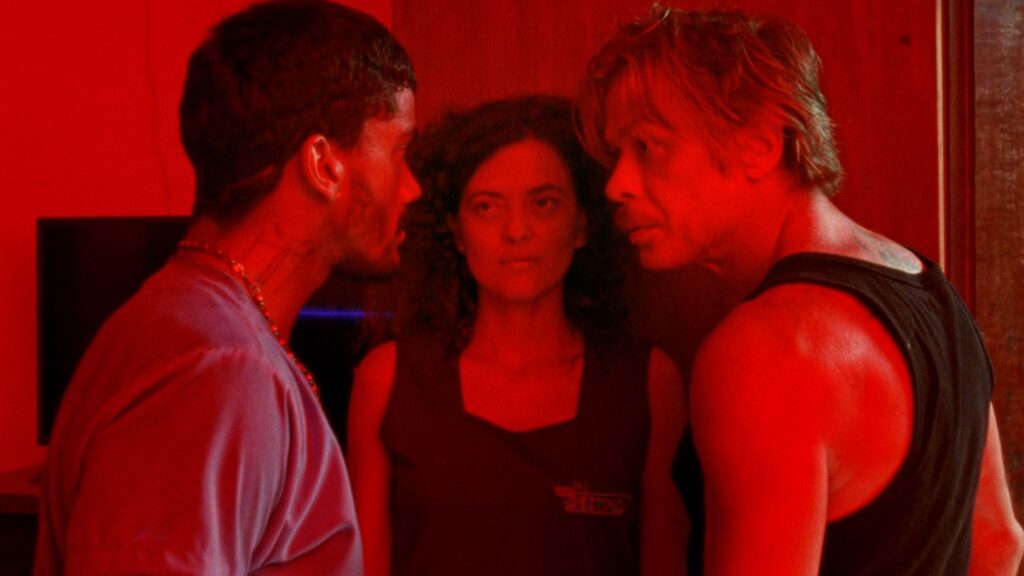 Iago Xavier as Heraldo, Nataly Rocha as Dayana and Fabio Assuncao as Elias in Motel Destino, directed by Karim Ainouz. Copyright: Curzon. All Rights Reserved.