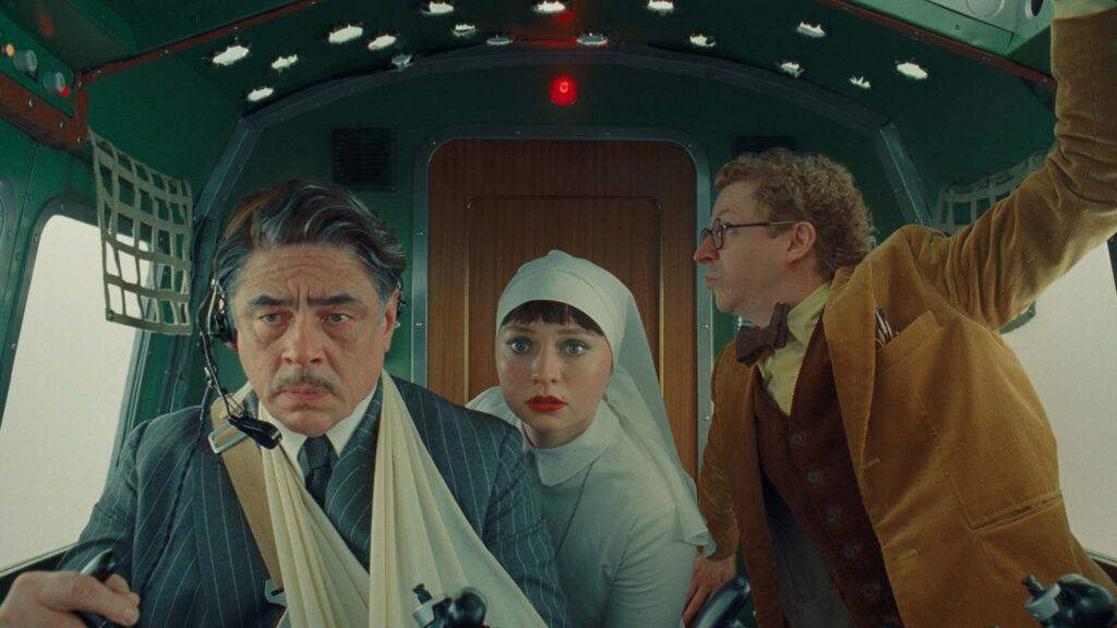Benicio Del Toro as Zsa-zsa Korda, Mia Threapleton as Liesl and Michael Cera as Bjorn in The Phoenician Scheme, directed by Wes Anderson. Copyright: TPS Productions/Focus Features. All Rights Reserved.