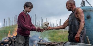 Alfie Williams as Spike and Ralph Fiennes as Dr Kelson in 28 Years Later, directed by Danny Boyle. Photo: Miya Mizuno. Copyright: 2025 CTMG, Inc. All Rights Reserved.