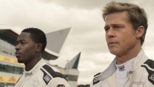 Damson Idris as Joshua Pearce and Brad Pitt as Sonny Hayes in F1: The Movie, directed by Joseph Kosinski. Copyright: 2025 Warner Bros. Entertainment Inc. All Rights Reserved.