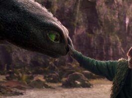 Mason Thames as Hiccup with his Night Fury dragon, Toothless, in How To Train Your Dragon, directed by Dean DeBlois. Copyright: Universal Studios. All Rights Reserved.