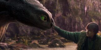 Mason Thames as Hiccup with his Night Fury dragon, Toothless, in How To Train Your Dragon, directed by Dean DeBlois. Copyright: Universal Studios. All Rights Reserved.