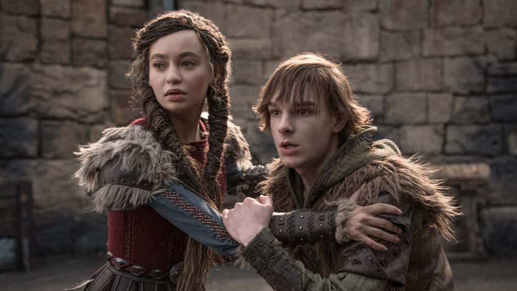 Nico Parker as Astrid and Mason Thames as Hiccup in How To Train Your Dragon, directed by Dean DeBlois. Photo: Helen Sloan. Copyright: Universal Studios. All Rights Reserved.