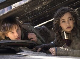 Mason Thames as Hiccup and Nico Parker as Astrid in How To Train Your Dragon, directed by Dean DeBlois. Photo: Helen Sloan. Copyright: Universal Studios. All Rights Reserved.