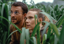 Jonathan Bailey as paleontologist Dr Henry Loomis and Scarlett Johansson as skilled covert operations expert Zora Bennett in Jurassic World Rebirth, directed by Gareth Edwards. Photo: Jasin Boland. Copyright: Universal Pictures and Amblin Entertainment. All Rights Reserved.